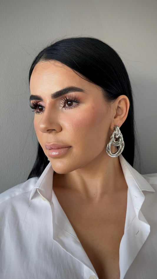 İç İçe Geçmiş Üçlü Halka Küpe - Modern Geometrik Tasarım Lüks Bijuteri